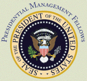 The presidential seal with an eagle has the words Presidential Management Fellows over it.