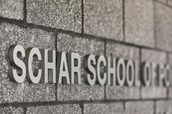 Photo of the Schar School name on a building
