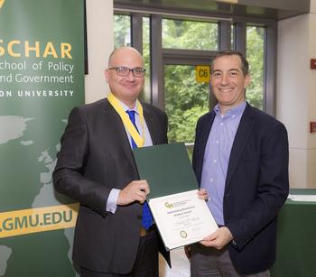 Nick Marko and Greg Koblentz with award